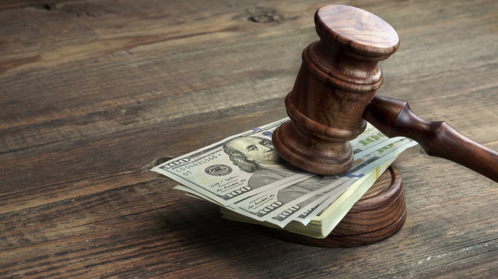 court gavel and a wad of money
