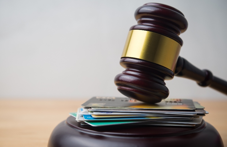 Gavel with credit cards