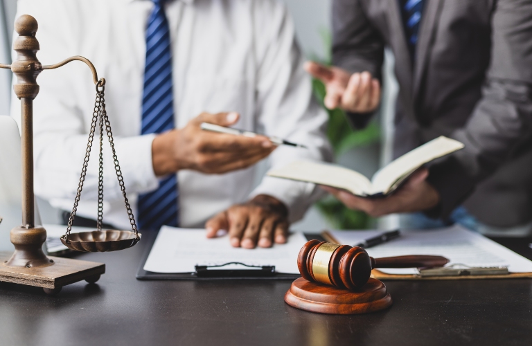Lawyer discussing legal case and working with contract